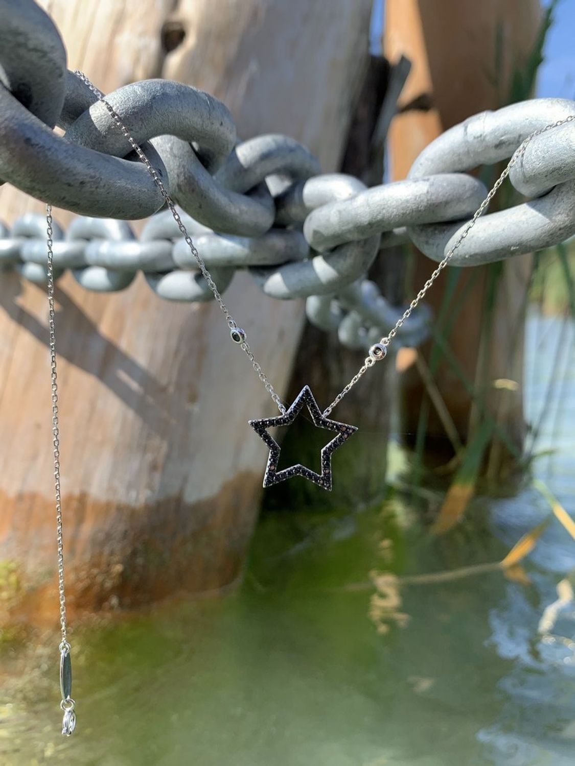 Naszyjnik srebrny gwiazdka z czarnymi cyrkoniami Dall'Acqua N BY 191 087.jpg